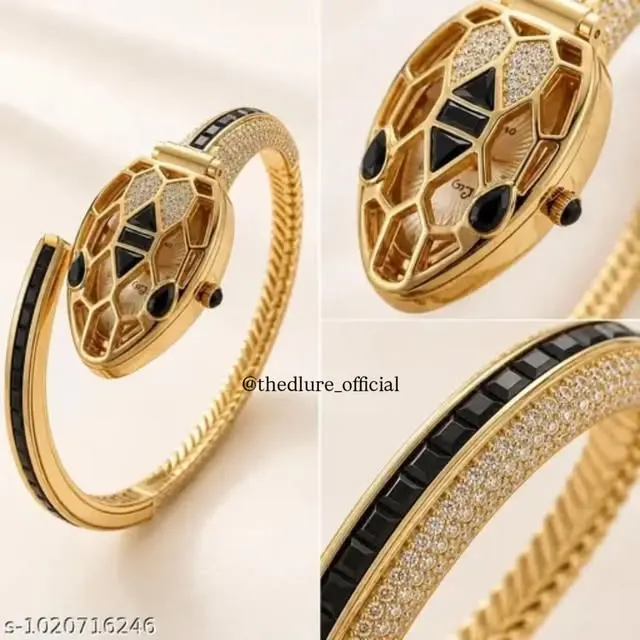 Serpent cuff watch with black baguette scales
